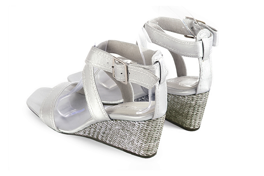 Women's silver elegant fully open cross straps sandals. Square toe. Medium wedge heels - Rear view
